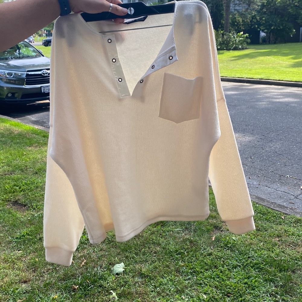 Tan sweater with pocket
